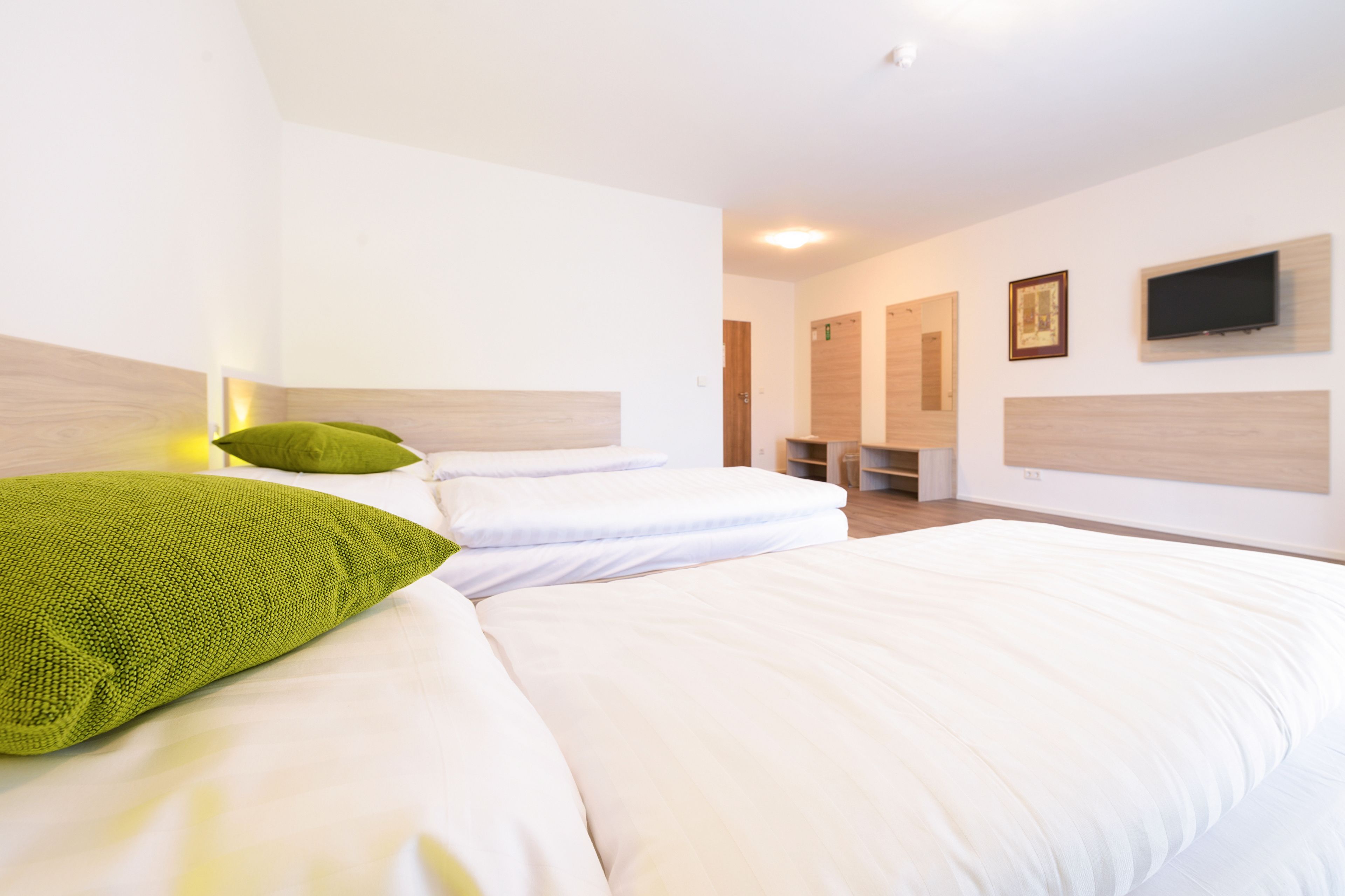 Habitación triple | Cunas (de pago), camas supletorias, wifi gratis