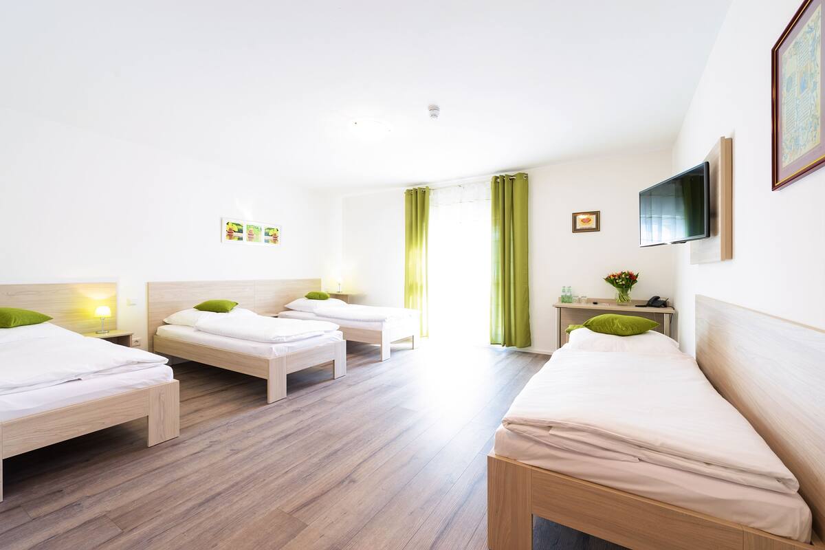 Quadruple Room | Cribs (surcharge), rollaway beds (surcharge), WiFi (free)