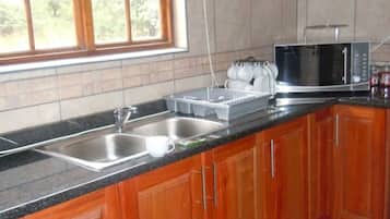 Family Chalet | Private kitchen | Full-size fridge, microwave, oven, stovetop