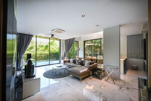 Four-Bedroom Villa with Private Pool | Living area | 55-inch LED TV with digital channels, TV, video-game console