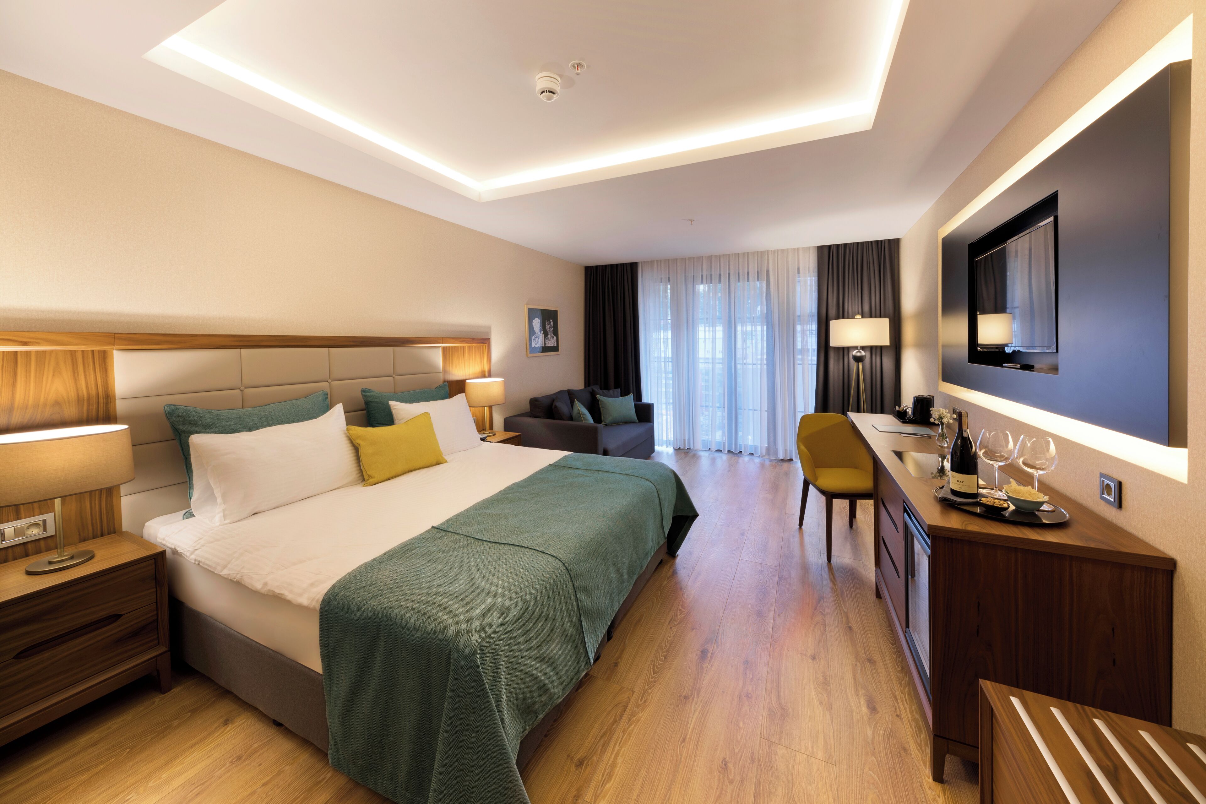 Deluxe Room | Premium bedding, minibar, in-room safe, individually decorated