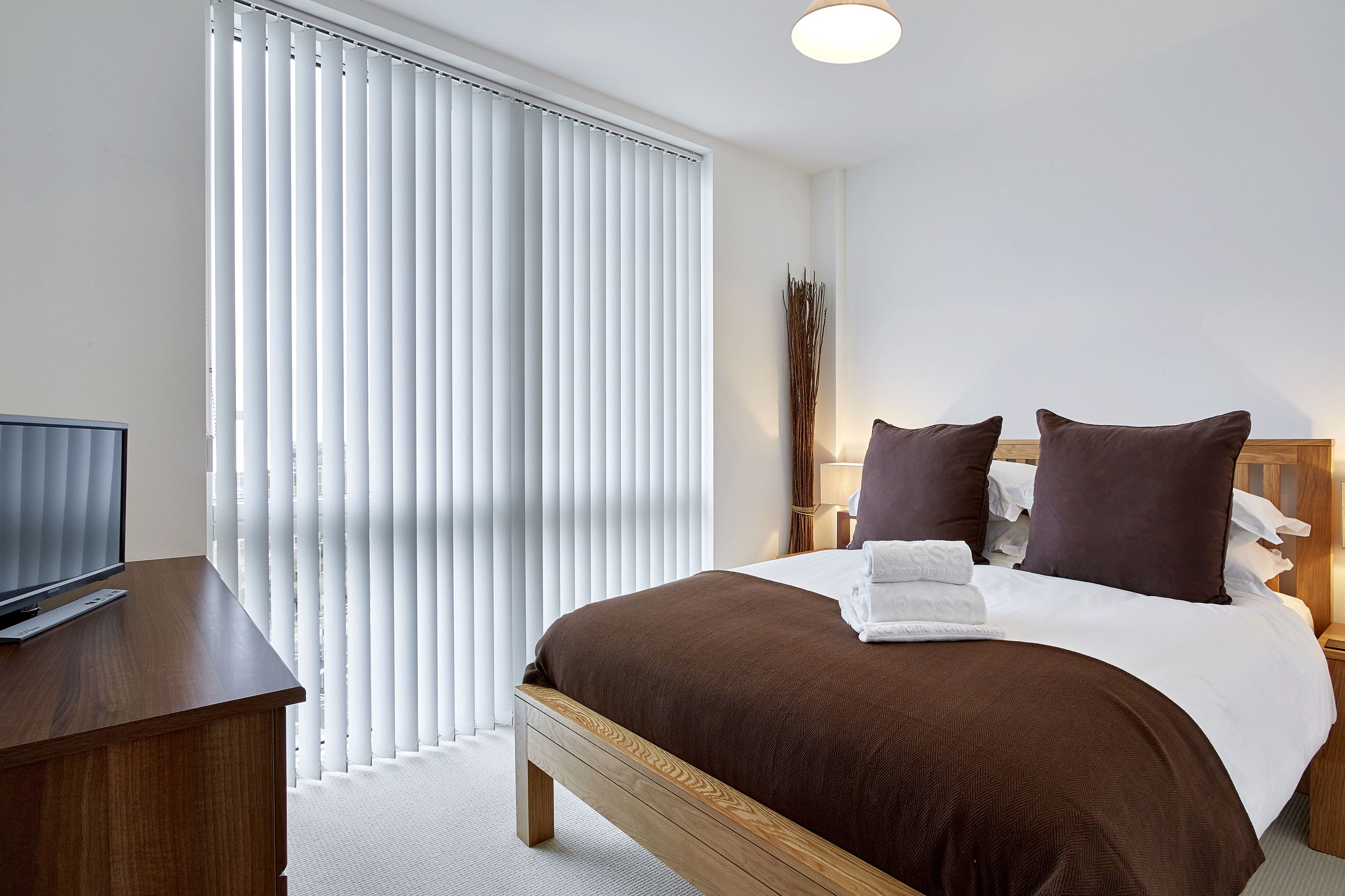 Coffres-forts dans les chambres, fer et planche à repasser