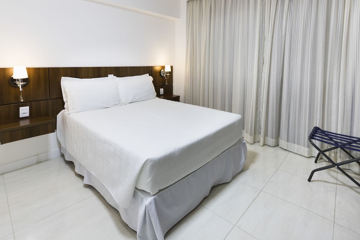 Suite Deluxe (City View) | 1 dormitori, minibar, cortines opaques i wifi gratuïta
