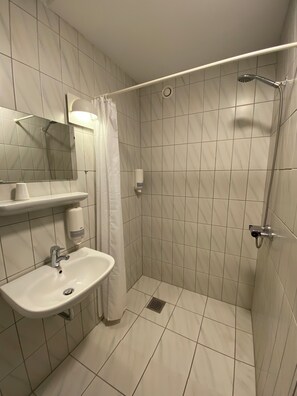 Shower, towels, soap, shampoo