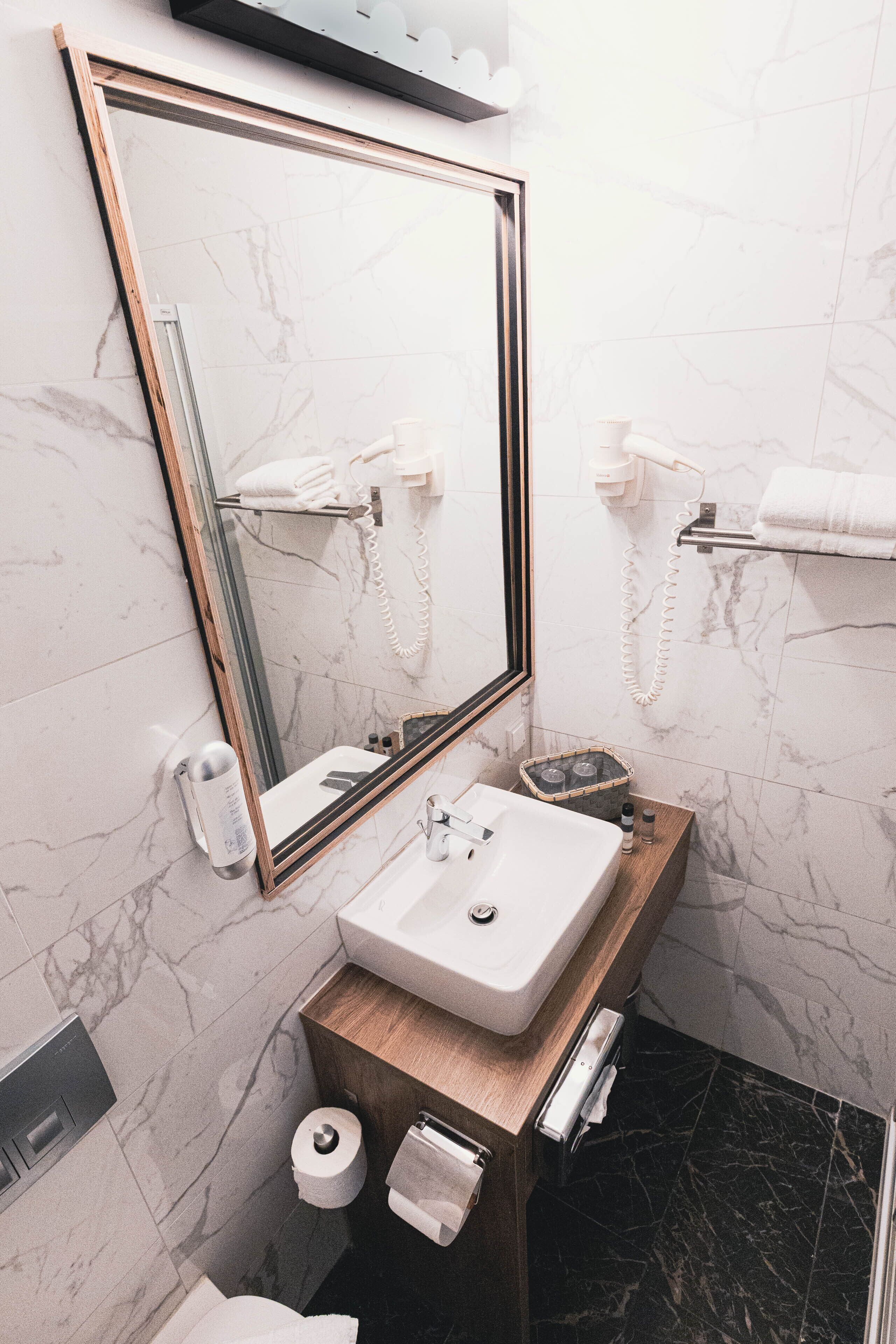 free toiletries, hair dryer, slippers, towels