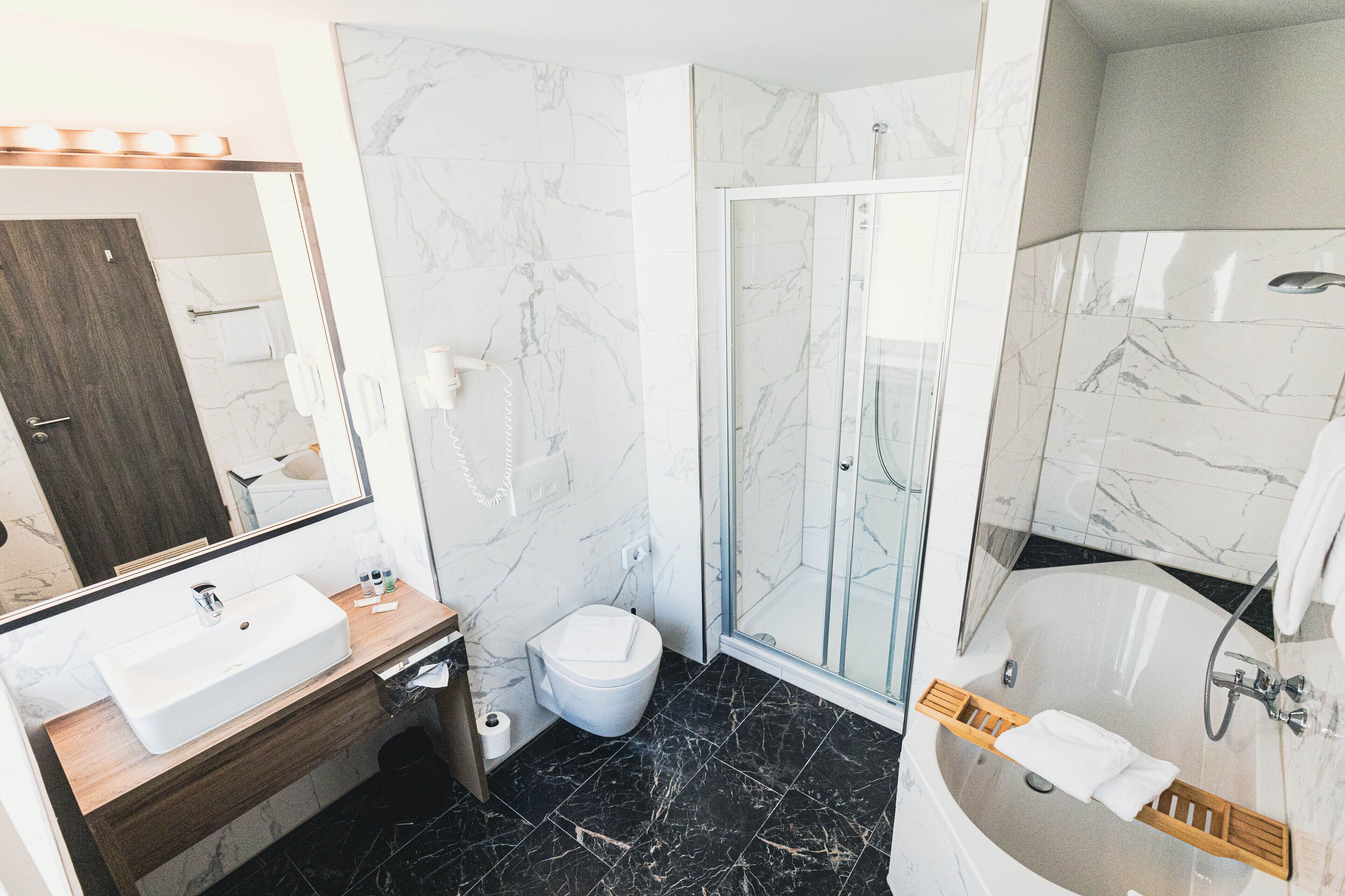 mini suite | bathroom | free toiletries, hair dryer, slippers, towels