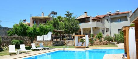 Outdoor pool, pool umbrellas, pool loungers