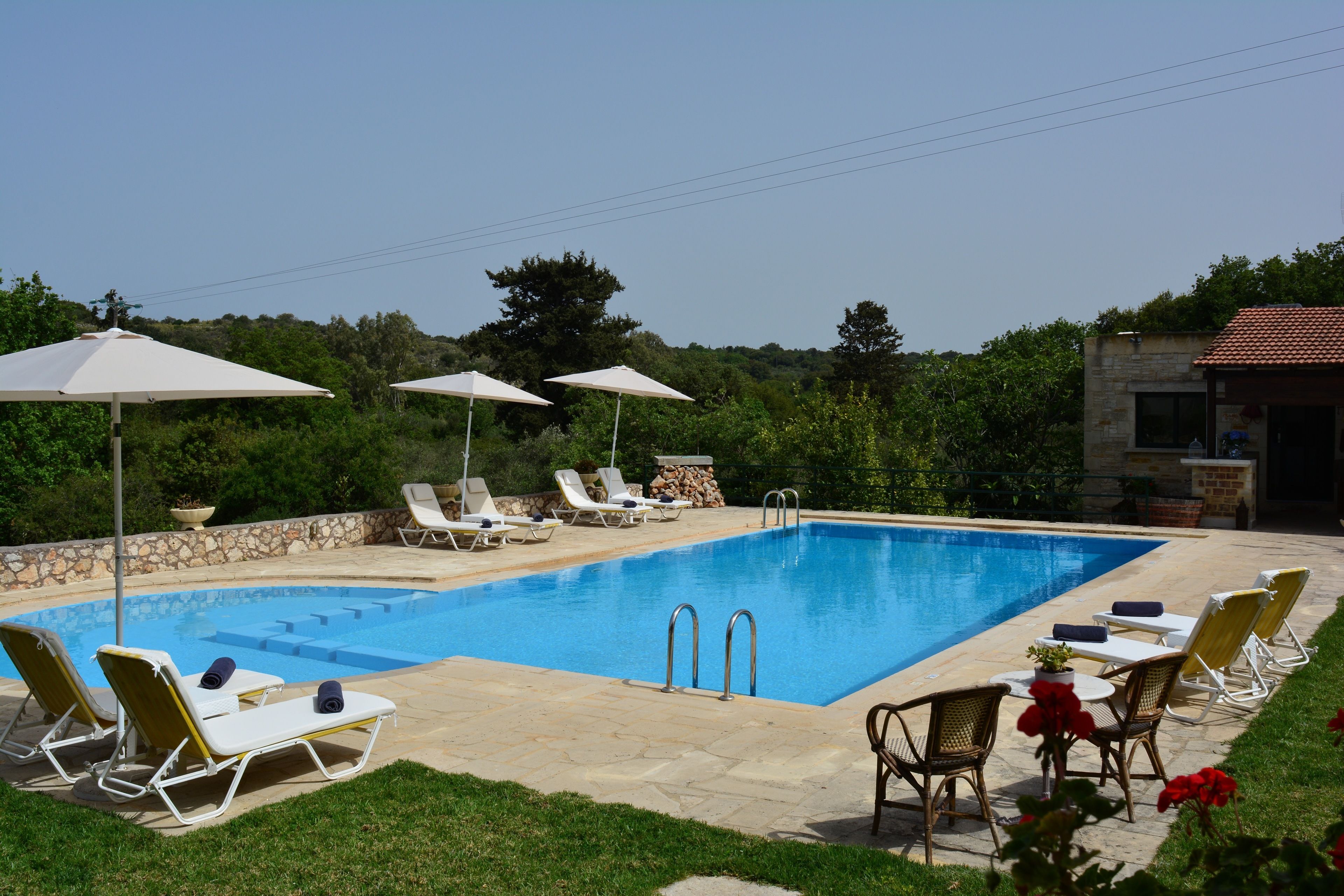 Outdoor pool, pool umbrellas, sun loungers