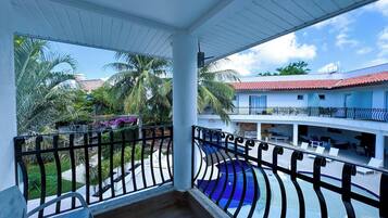 Deluxe Room, 1 Queen Bed, Pool View | Desk, blackout curtains, iron/ironing board, free WiFi