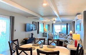 Luxury Villa, 3 Bedrooms, Kitchen, Ocean View | Living area | 50-inch flat-screen TV with cable channels, TV - Organic Beach Retreat (Daytona Beach Shores)