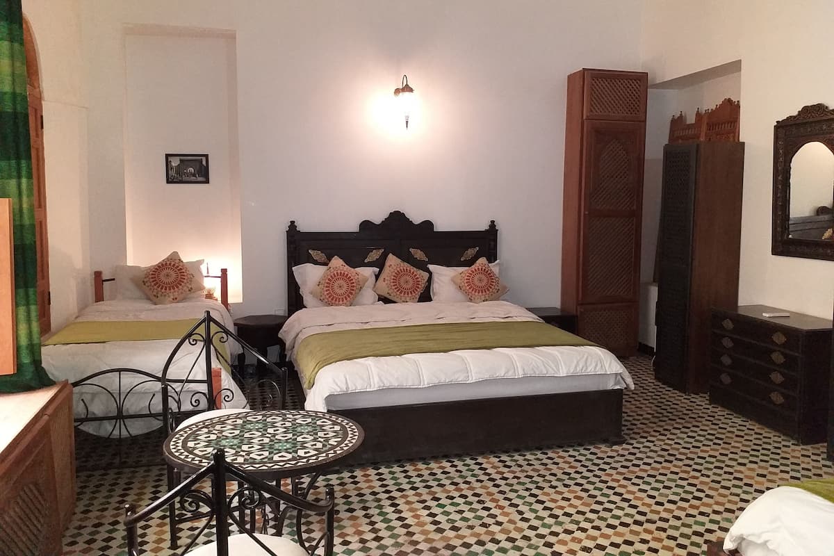 Suite, Multiple Beds, Non Smoking | Premium bedding, individually decorated, individually furnished