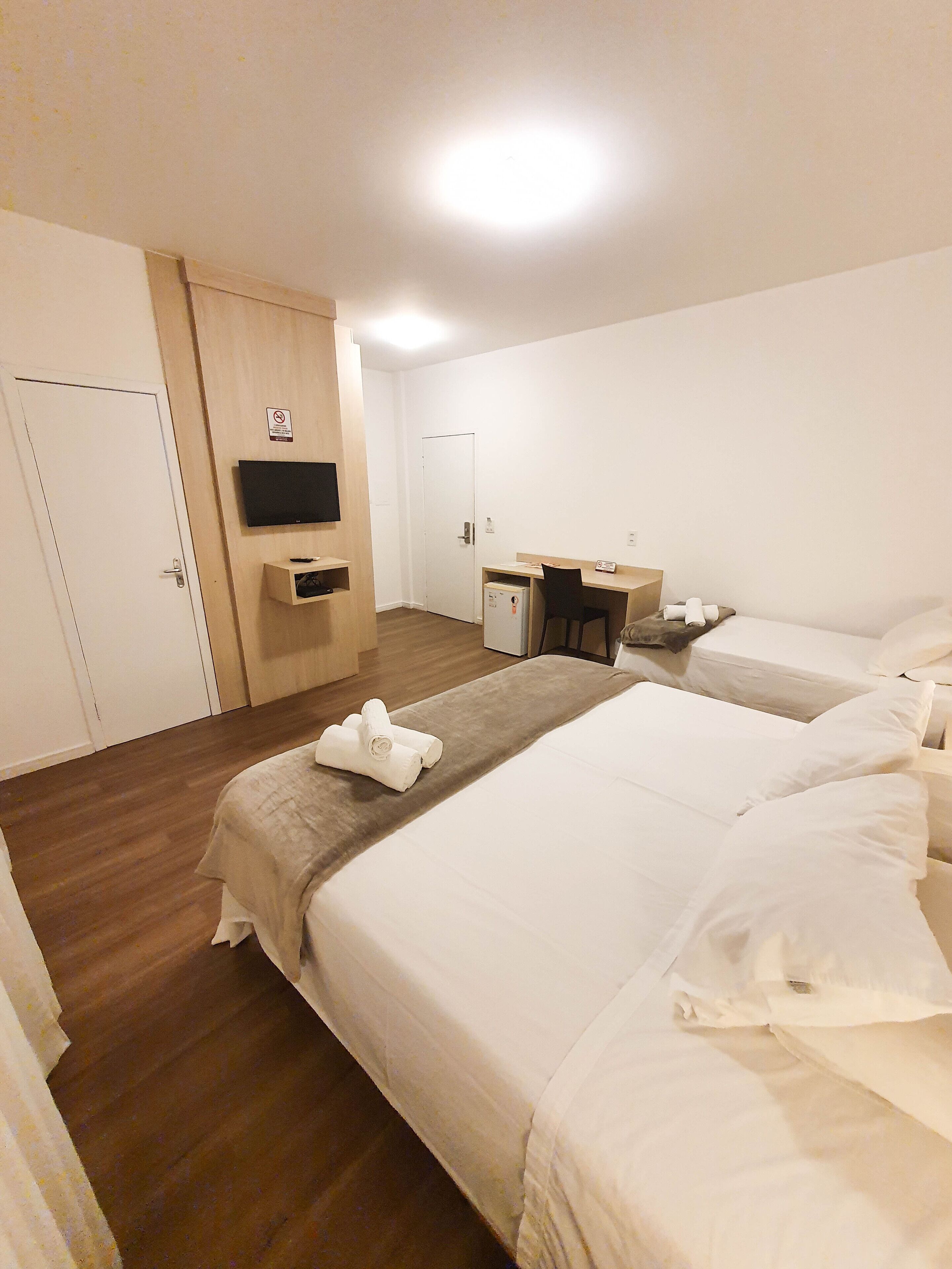 superior triple room | 1 bedroom, in-room safe, desk, blackout curtains