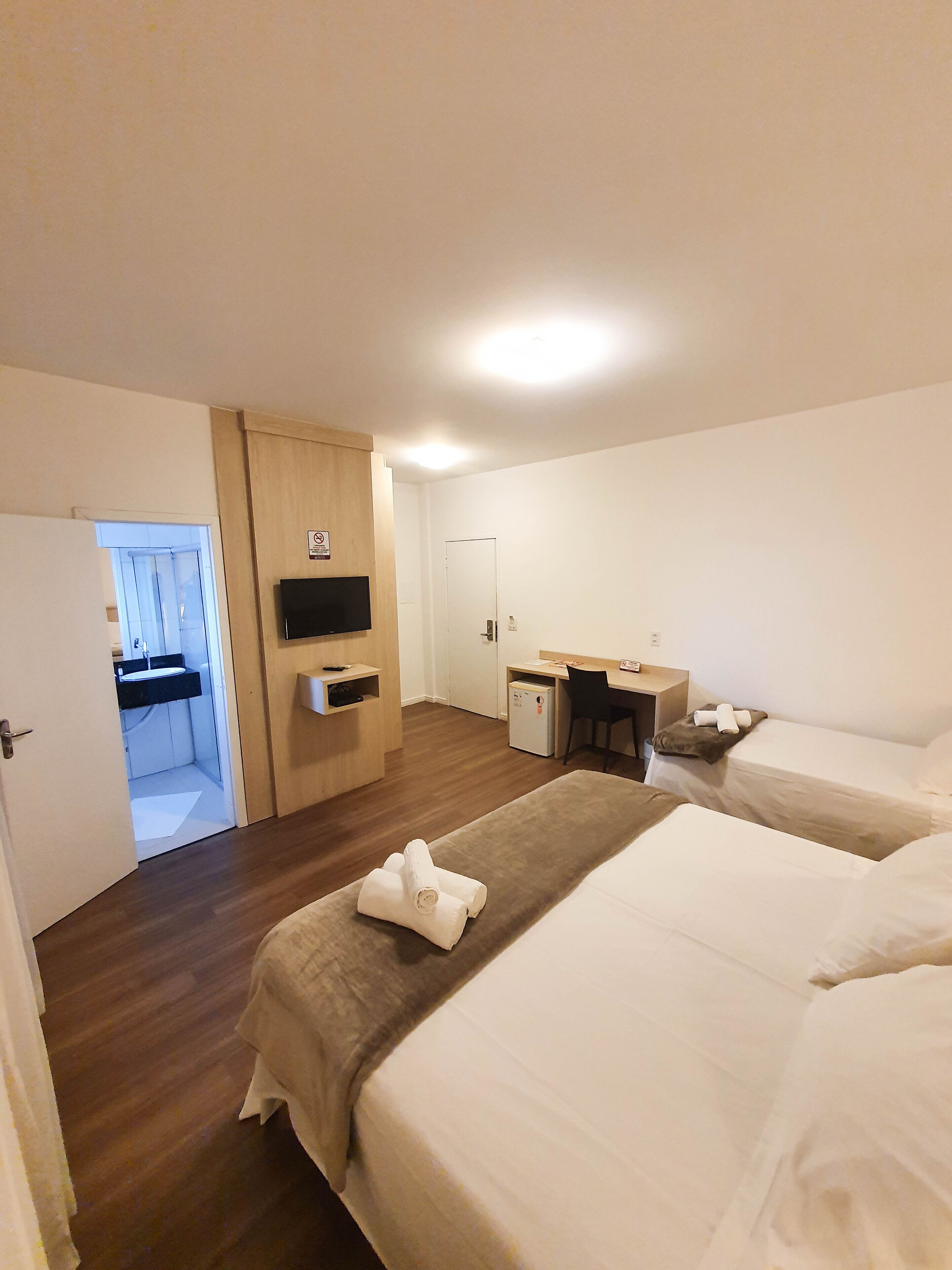 superior triple room | 1 bedroom, in-room safe, desk, blackout curtains