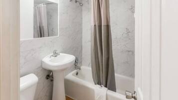 Shower, rainfall showerhead, towels