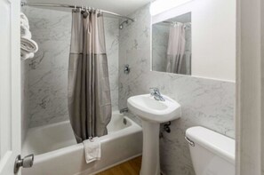 Shower, rainfall showerhead, towels