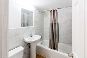Shower, rainfall showerhead, towels