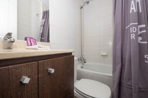 Apartment, 2 Bedrooms | Bathroom | Combined shower/tub, free toiletries, hair dryer, towels - Boutique La Gloria Apartments (Santiago)