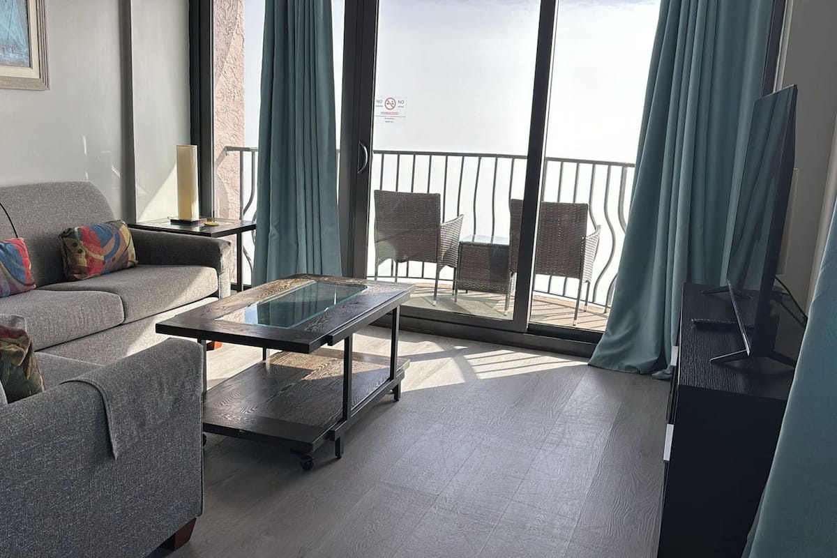 Premium Condo, 3 Bedrooms, Balcony, Ocean View | Living room | 50-inch flat-screen TV with satellite channels, TV