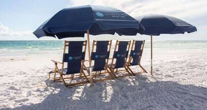 Touched by the Sun | July 4th Week Special: FREE GOLF CART! 1 PM Check In | Deeded Access with Free Beach Chairs & Umbrellas 100 Yards Away! $25,000 In Upgrades and New Polywood!