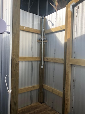 Combined shower/bathtub, hair dryer, towels, soap