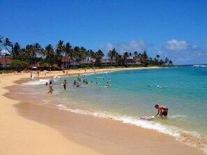 On the beach, sun-loungers, beach towels