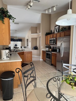 Fridge, microwave, oven, stovetop - 4BR Family Retreat w/ Private Pool, Spa & Game Room – Near Disney (Davenport)