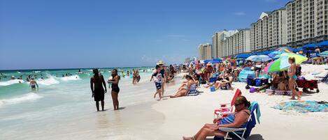 On the beach, sun loungers