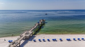 A pier extending into the sea with a beach in the foreground. - Million Dollar View from Your Balcony! (Orange Beach)