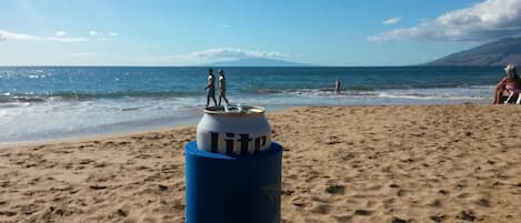 On the beach, sun loungers, beach towels