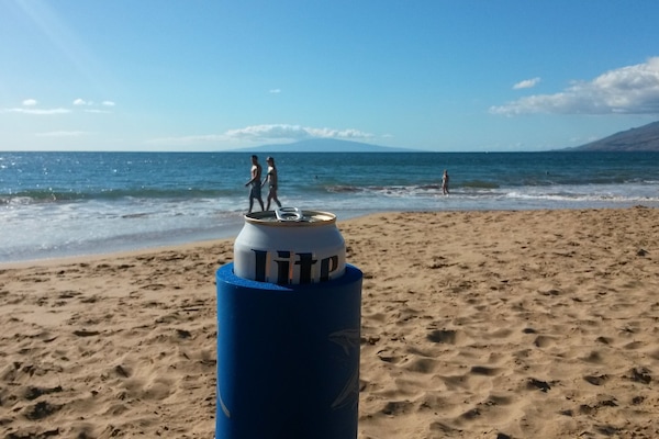 On the beach, sun-loungers, beach towels