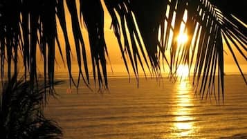 On the beach, sun loungers, beach towels