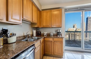 Fridge, microwave, oven, stovetop - 55th Floor Penthouse with Award-Winning Views (Chicago)