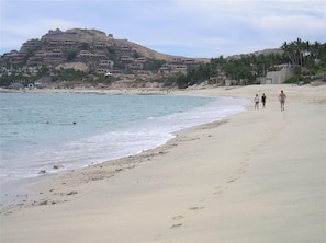 A beach with a hill in the background. - Newly Remodeled Gorgeous Palmilla Villa,  private beach 1 min walk (San Jose del Cabo)