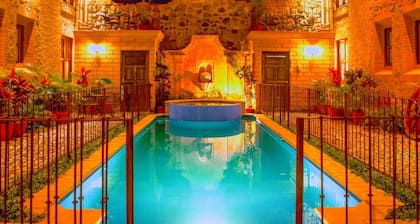 Comfy room with fast WiFi, community atmosphere, private work space & free bfast!