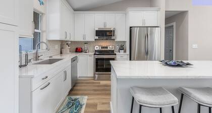 Peaceful fresh water canal home with heated pool. Incredible Value.