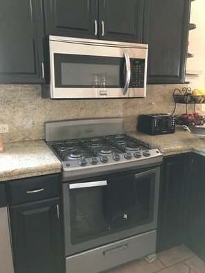 Fridge, microwave, oven, stovetop