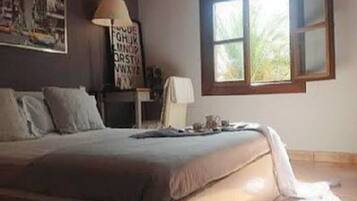 2 bedrooms, desk, iron/ironing board, travel crib