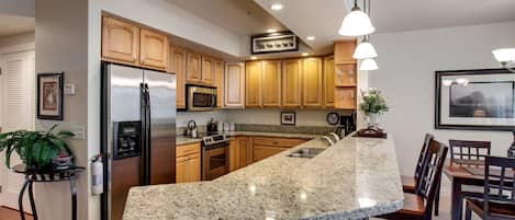 Coffee/tea maker, fridge, microwave, oven
