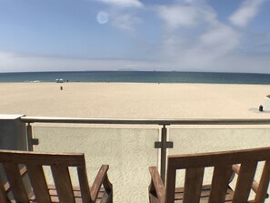 On the beach, sun loungers, beach towels