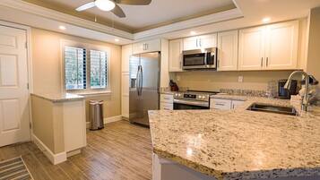 Coffee/tea maker, fridge, microwave, oven