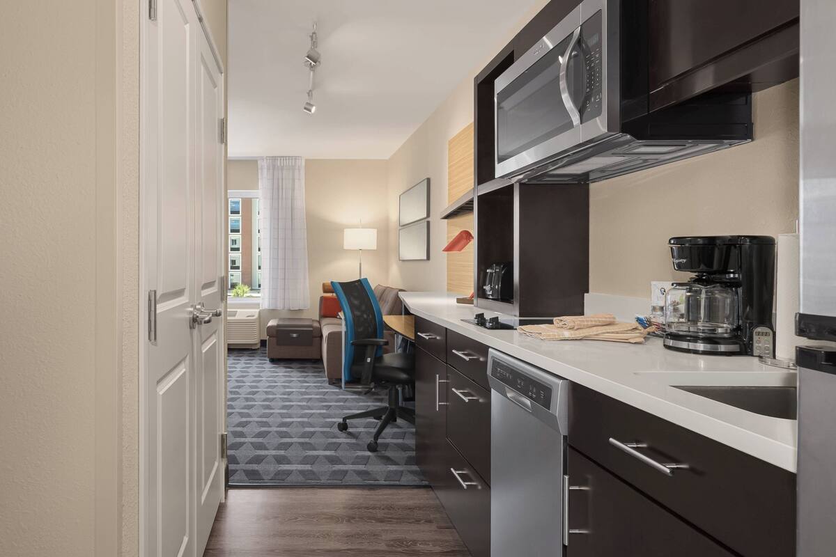 Premium bedding, pillow-top beds, desk, laptop workspace