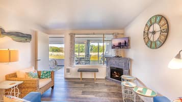 Deluxe Condo, 2 Bedrooms, Fireplace, Oceanfront | Living area | Flat-screen TV, fireplace, DVD player