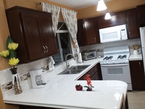 Fridge, microwave, oven, stovetop - 93 UNIT A LOS PELICANOS AT LAS GAVIOTAS COMMUNITY (Rosarito Beach Baja)