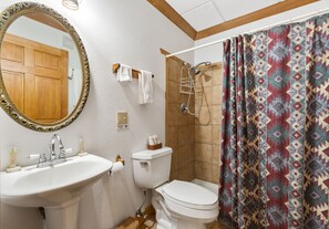 Combined shower/tub, hair dryer, towels, soap