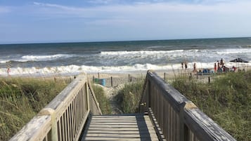 On the beach, sun loungers, beach towels
