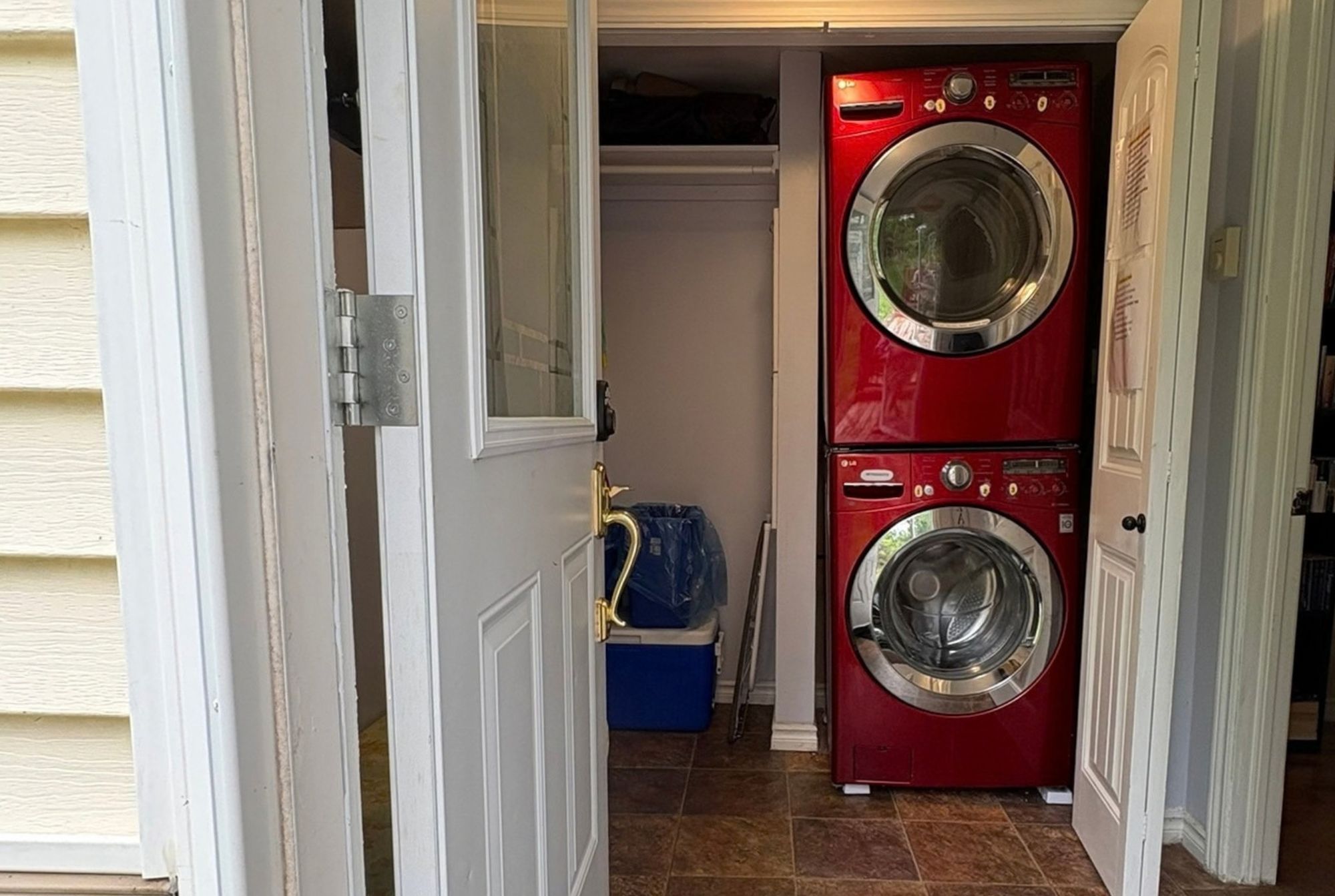 Laundry pair located behind bifold doors in the front entrance 