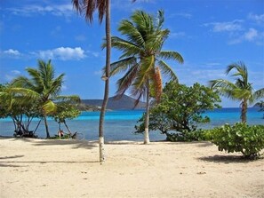 On the beach, sun-loungers, beach towels