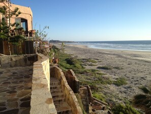 On the beach, sun loungers, beach towels