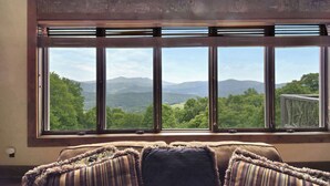 A room with a large window overlooking a mountainous landscape. - Multi-Million Dollar Mountain Estate-FOUR STATE VIEWS (Banner Elk)
