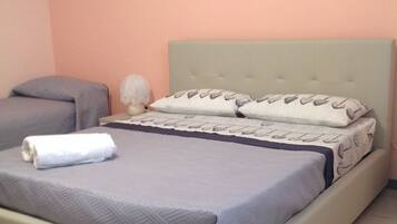 Deluxe Triple Room, 2 Bedrooms, Sea View | Desk, soundproofing, free cribs/infant beds, free WiFi